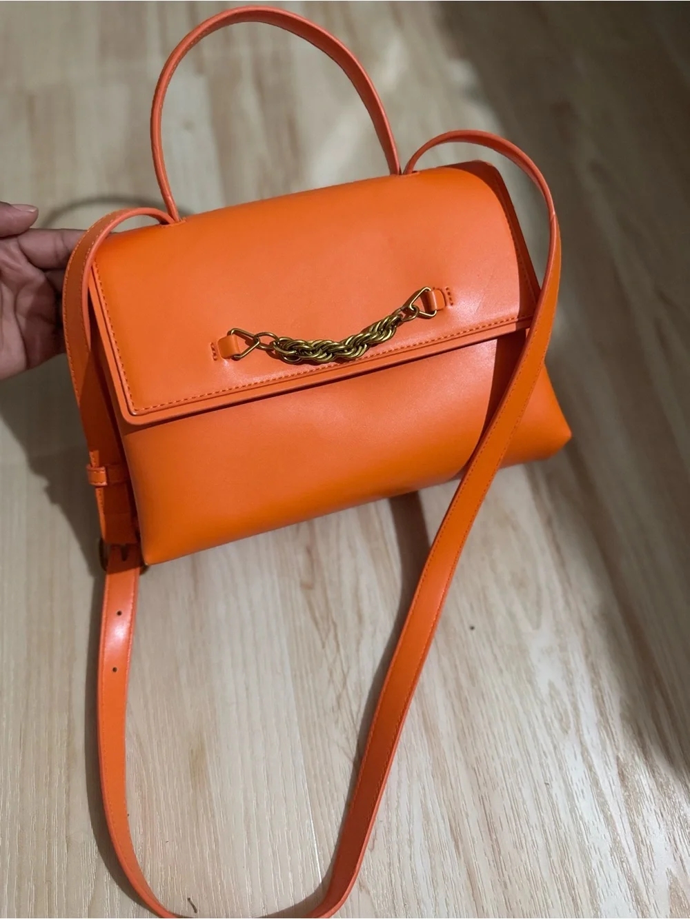 Orange Leather Top-Handle Crossbody Bag with Gold Chain Accent